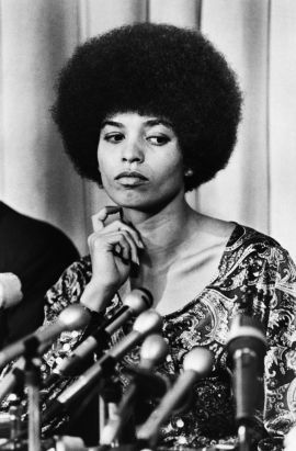 23 Sep 1969, Los Angeles, California, USA --- Admitted Communist and UCLA philosophy instructor Angela Davis said at a press conference that she was fired for racist, not political reasons. --- Image by © Bettmann/CORBIS